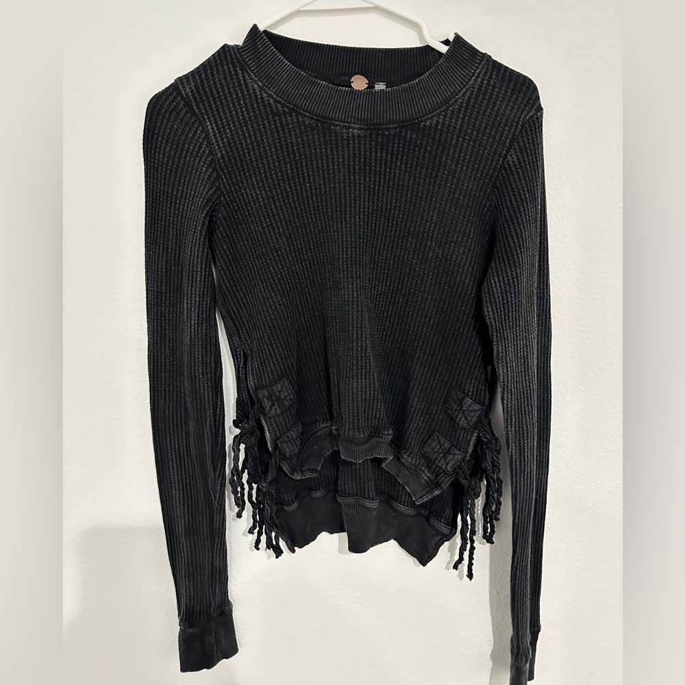 Black/dark navy distressed Free People Sweater. Very flattering. Size XS